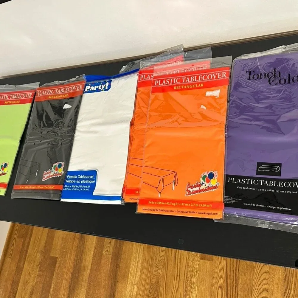 NEW - Lot of 7 Plastic tablecloths, Assorted Colors